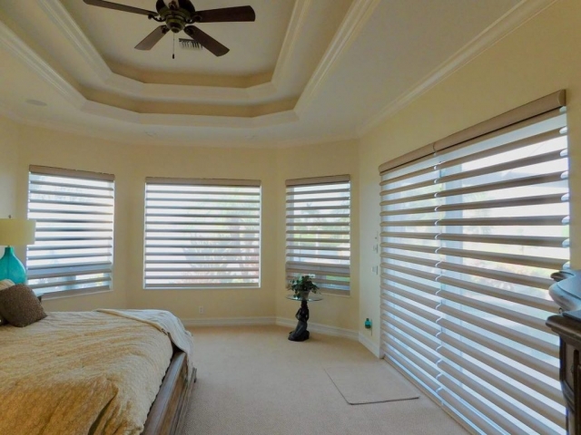 Powerview Hunter Douglas Pirouette Shades in the Master Bedr...